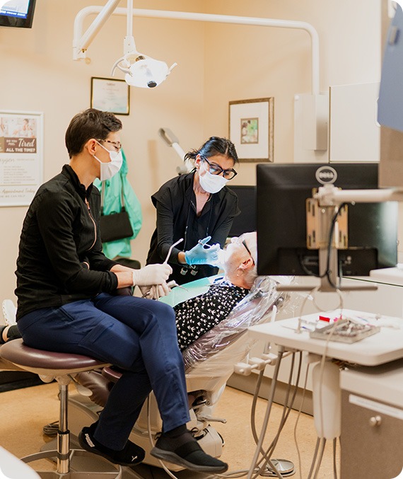 Dr. Salima Shariff with Patient | Millennium Dental | General & Family Dentist | SE Calgary